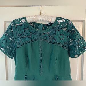 Emerald green fit and flare semi-formal dress